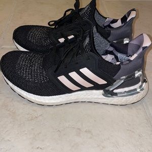 Adidas black and light pink tennis shoes.